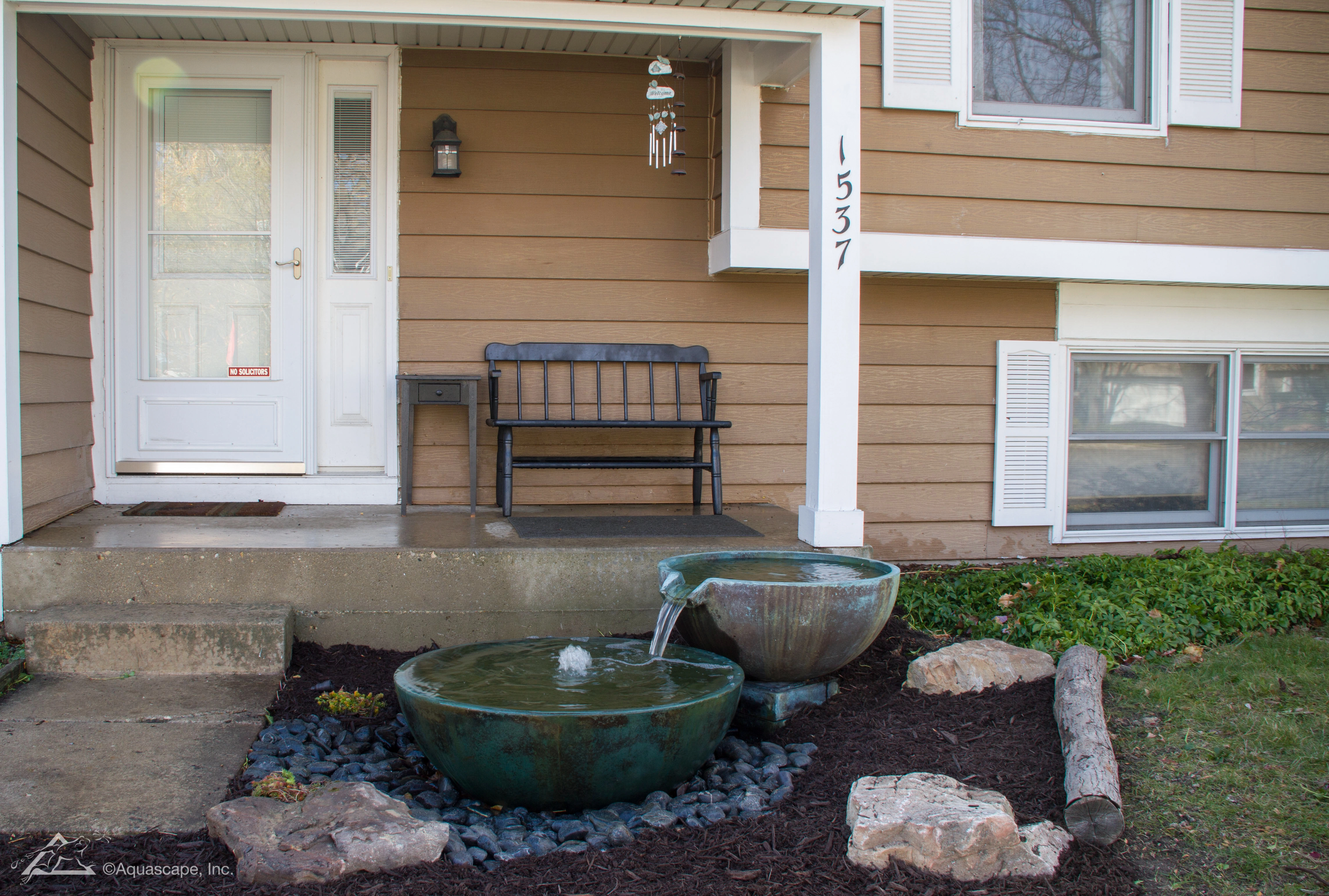 Small space fountain bowls used as a compact backyard water feature