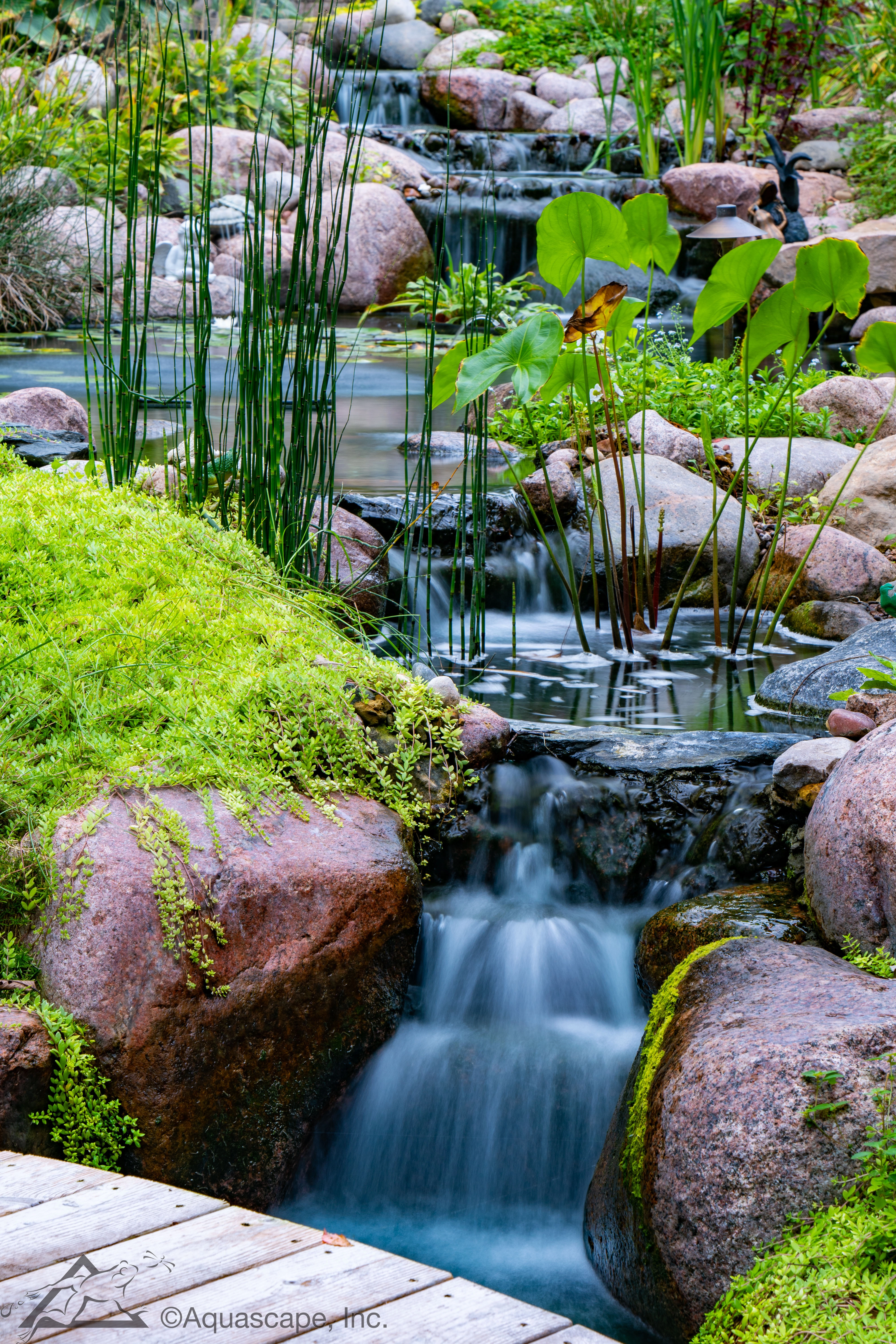 Pondless waterfall near a patio