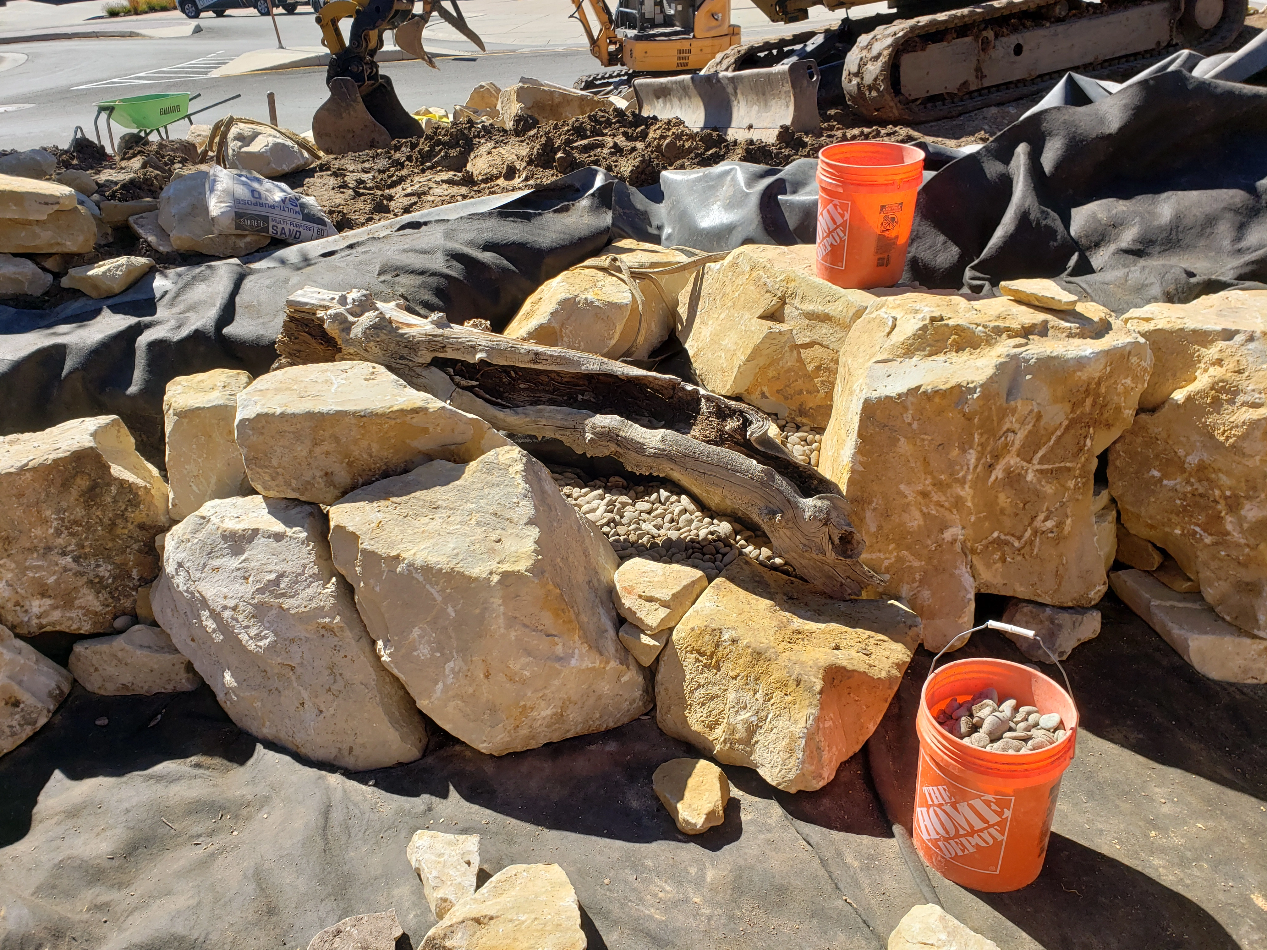 Driftwood detail in a water feature setting