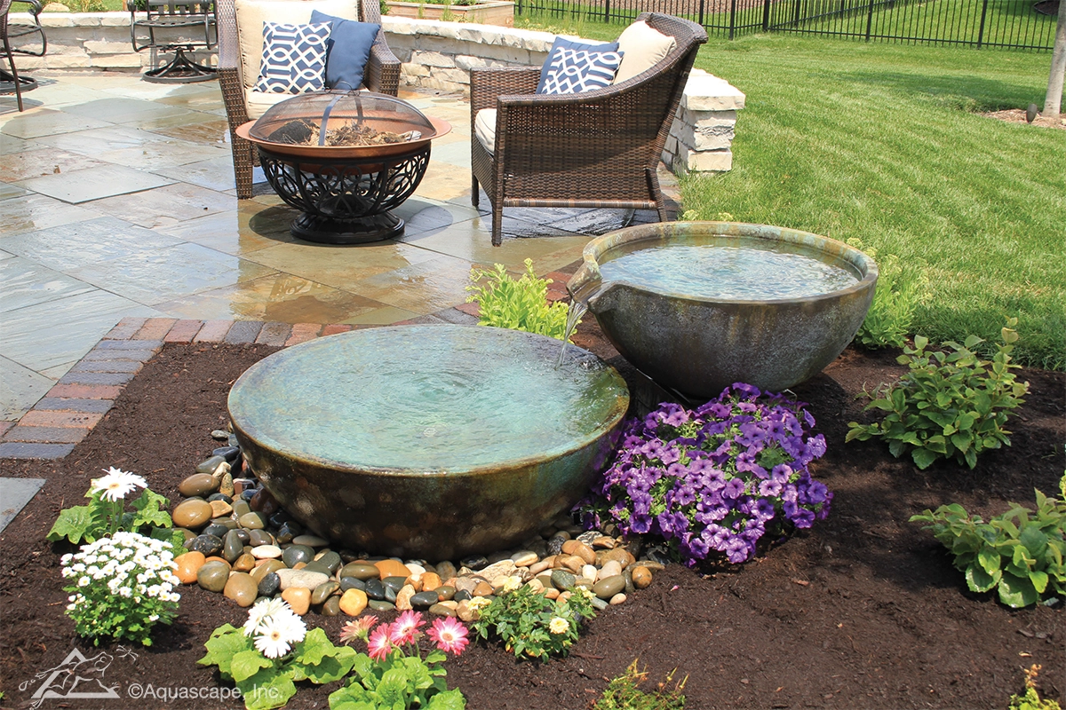 Spillway bowl and basin fountain near patio in Cottage Grove Minnesota