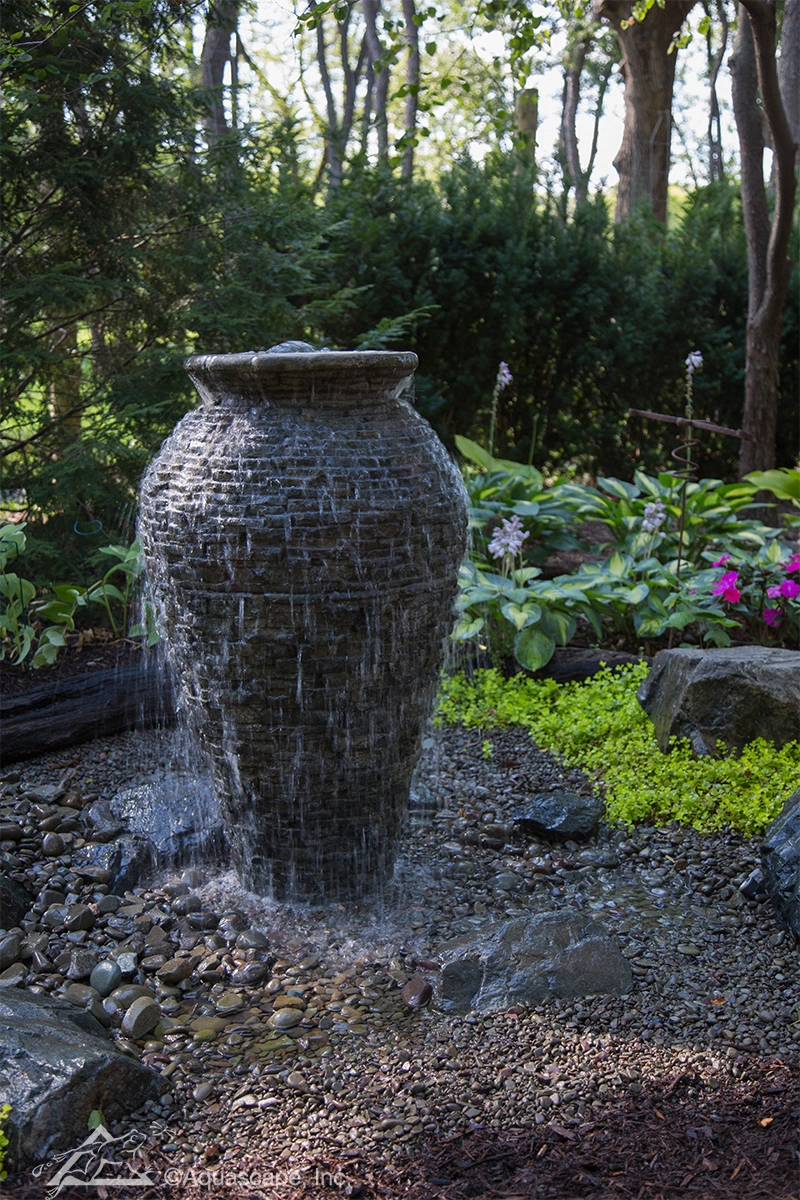 Stacked slate urn fountain for a Farmington Minnesota landscape