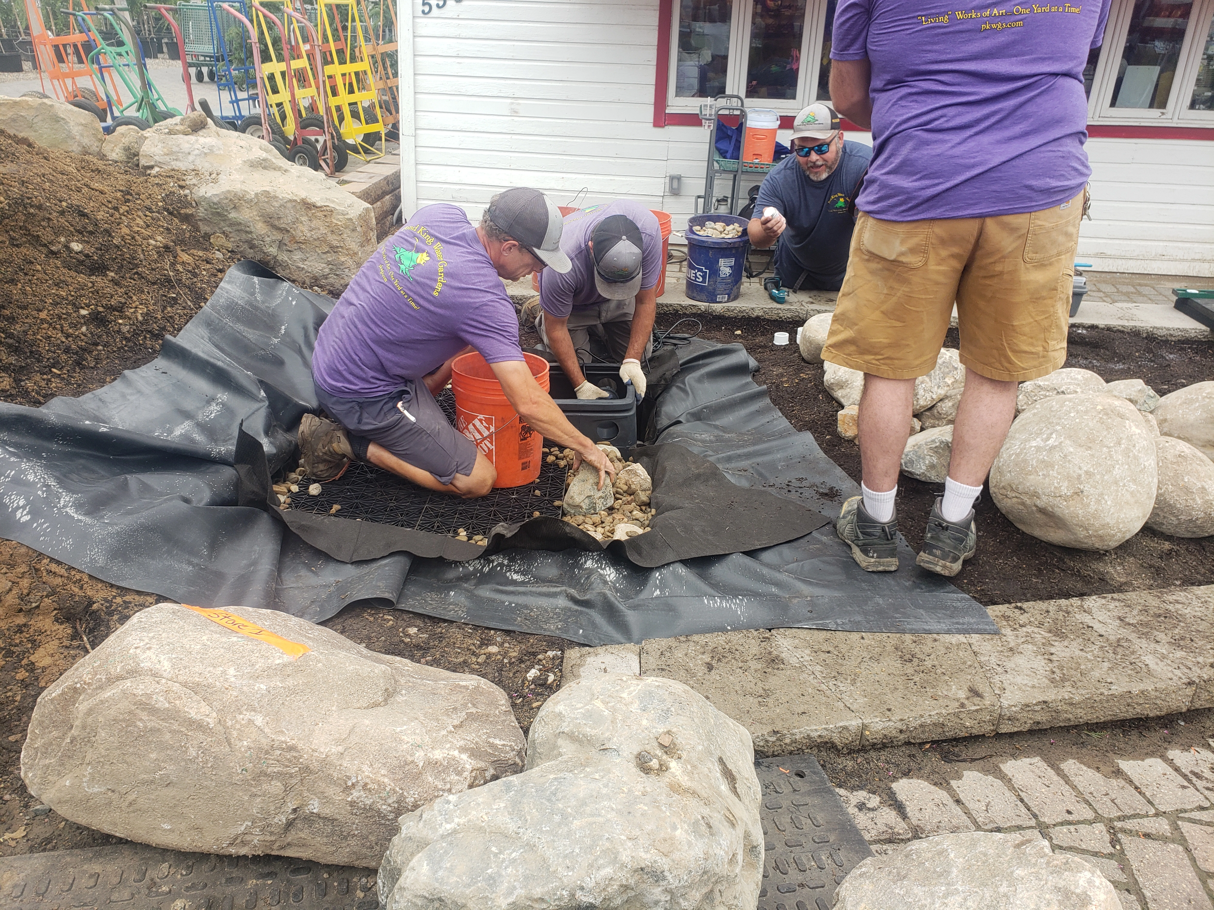 Pondless waterfall reservoir and construction area taking shape