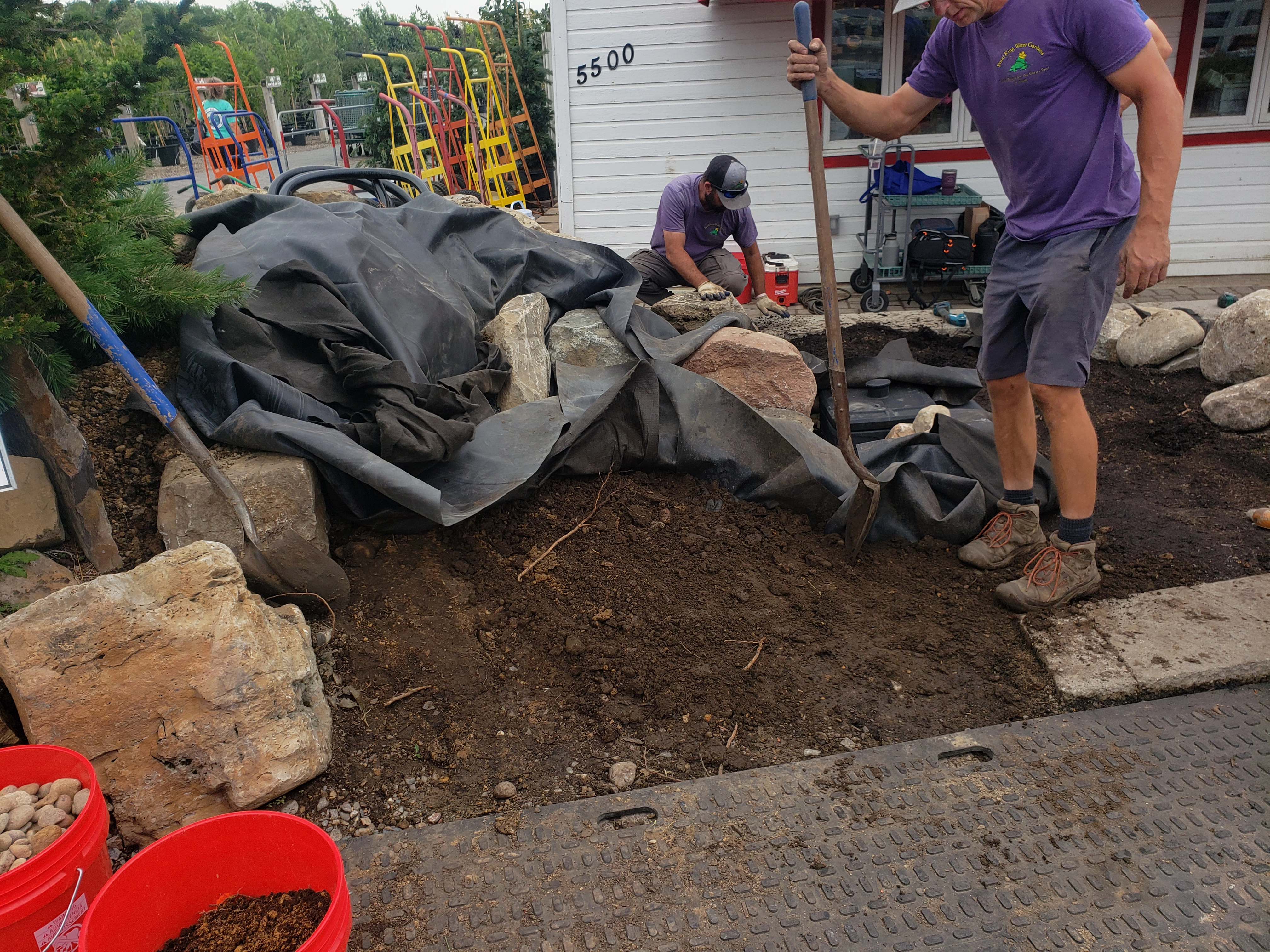 Pondless waterfall underlayment liner and plumbing installation progress