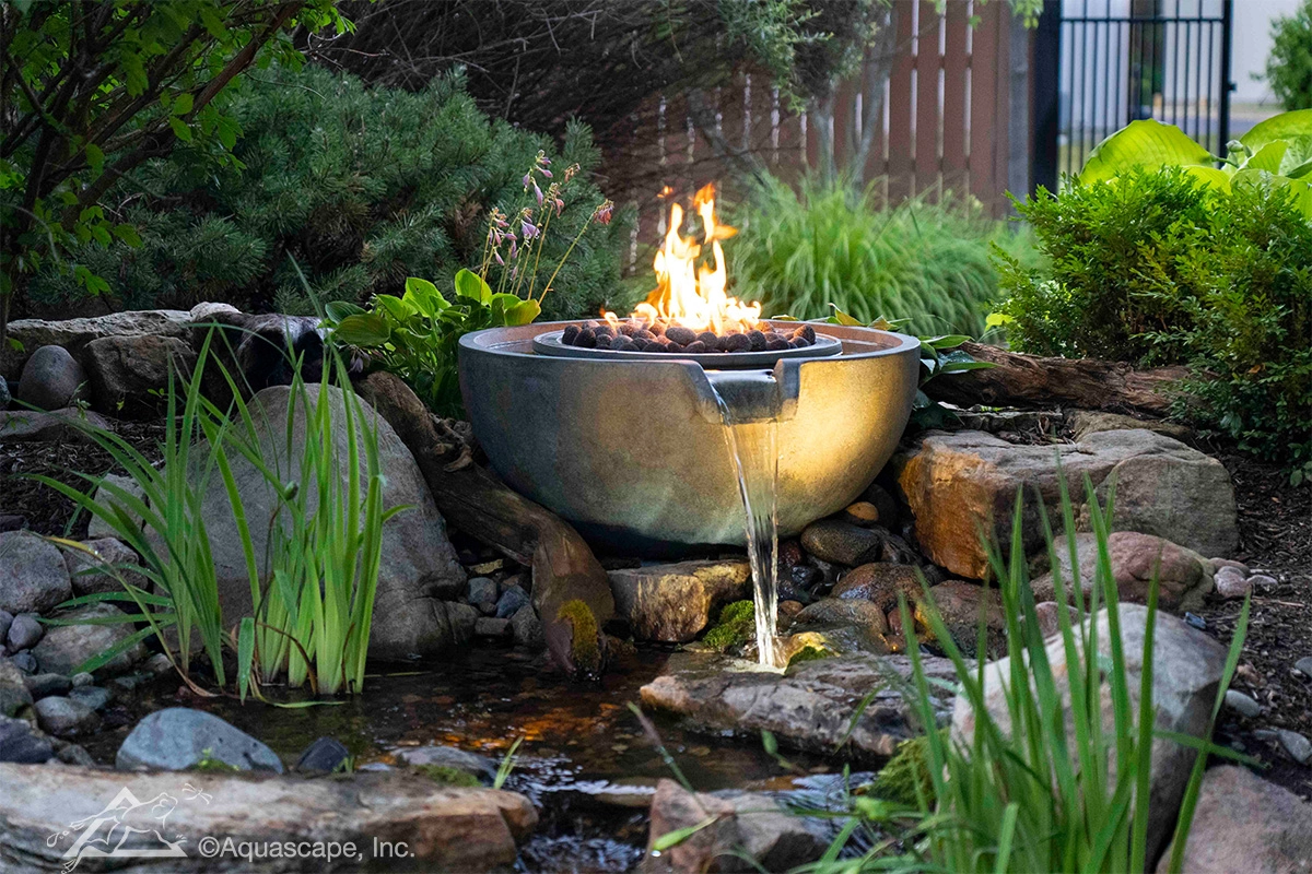 Fire and water spillway bowl feature with natural stone in Marshall Minnesota