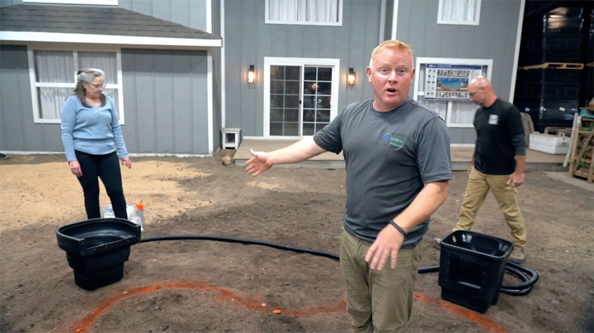 Pond skimmer, BioFalls filtration, and plumbing components positioned during ecosystem pond installation