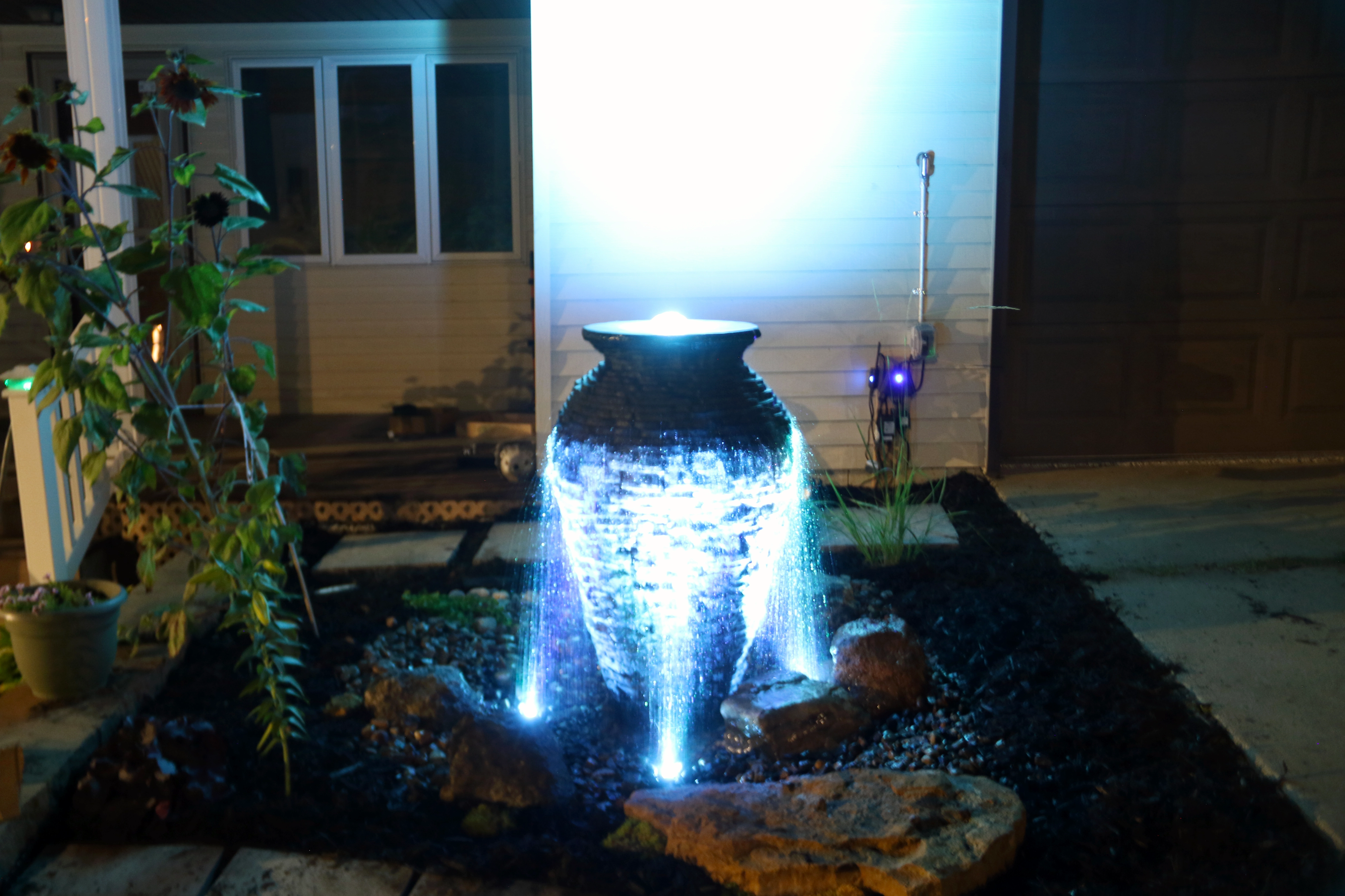 Night time fountainscape with colored lights in New Ulm, MN