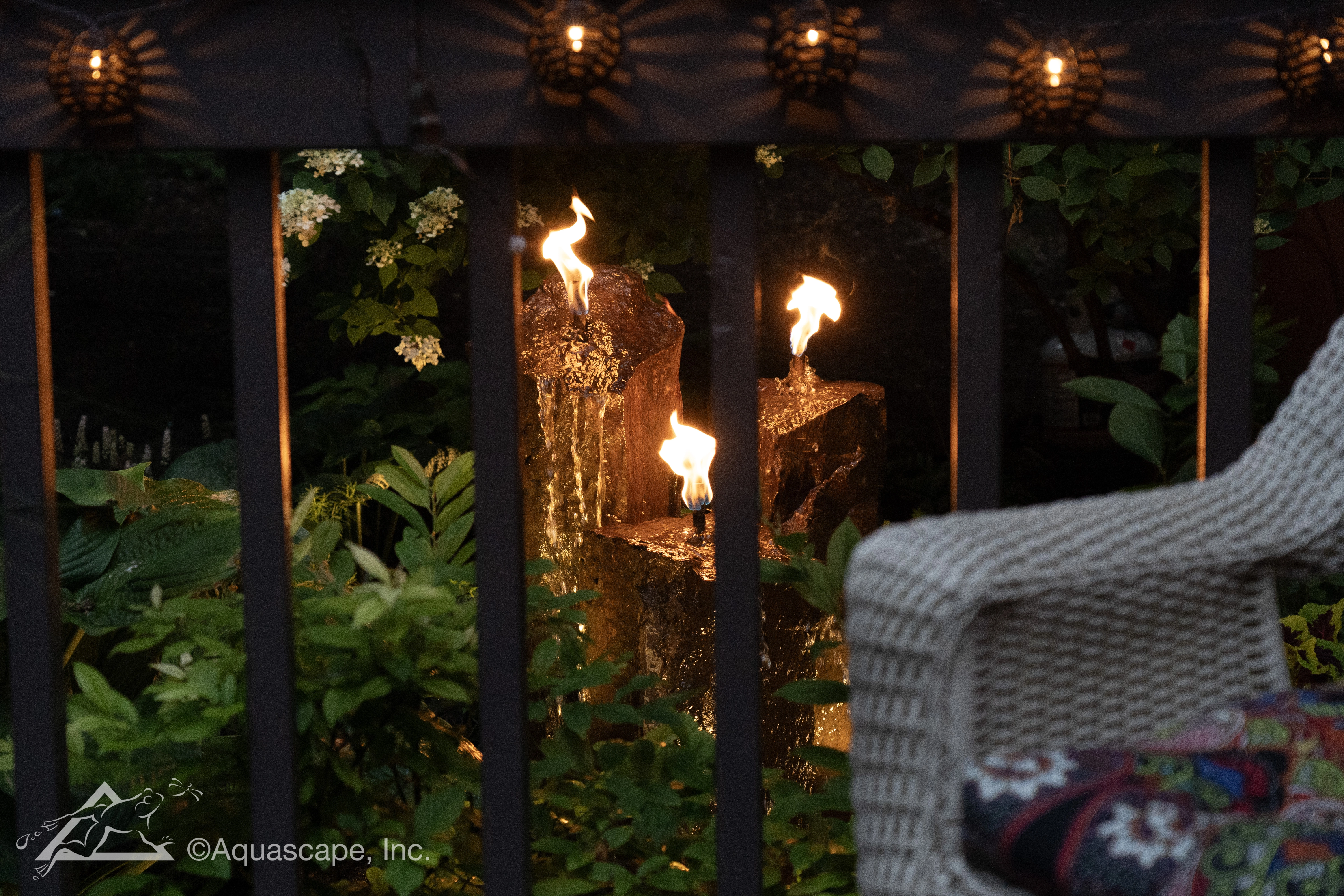 Fire and water basalt column feature at night in Stillwater Minnesota